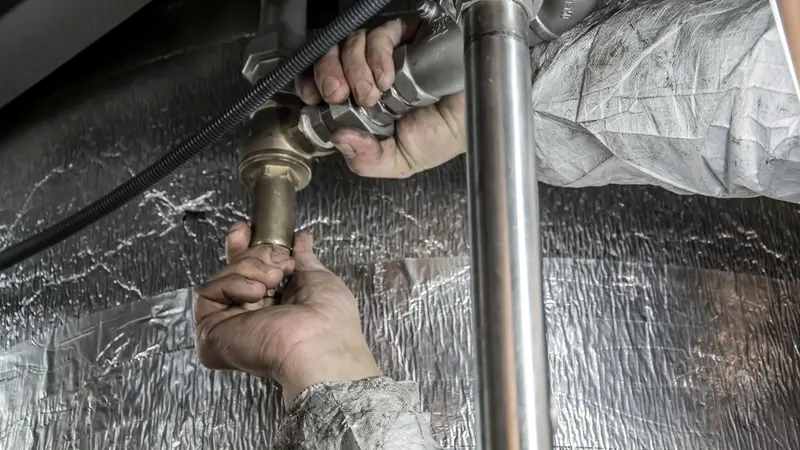 Plumber fitting pipes